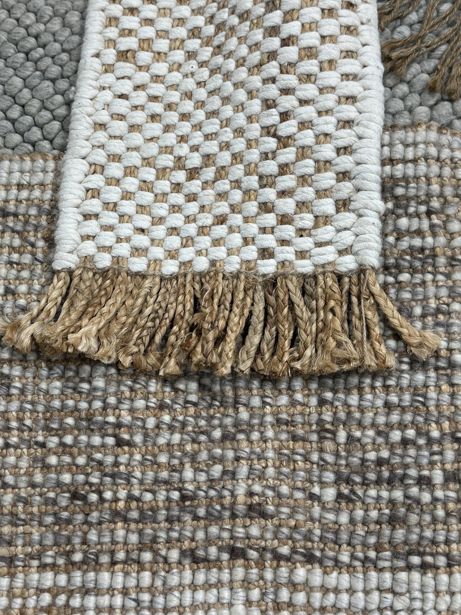 A finished jute rug at PiHue — volume programme, biodegradable
