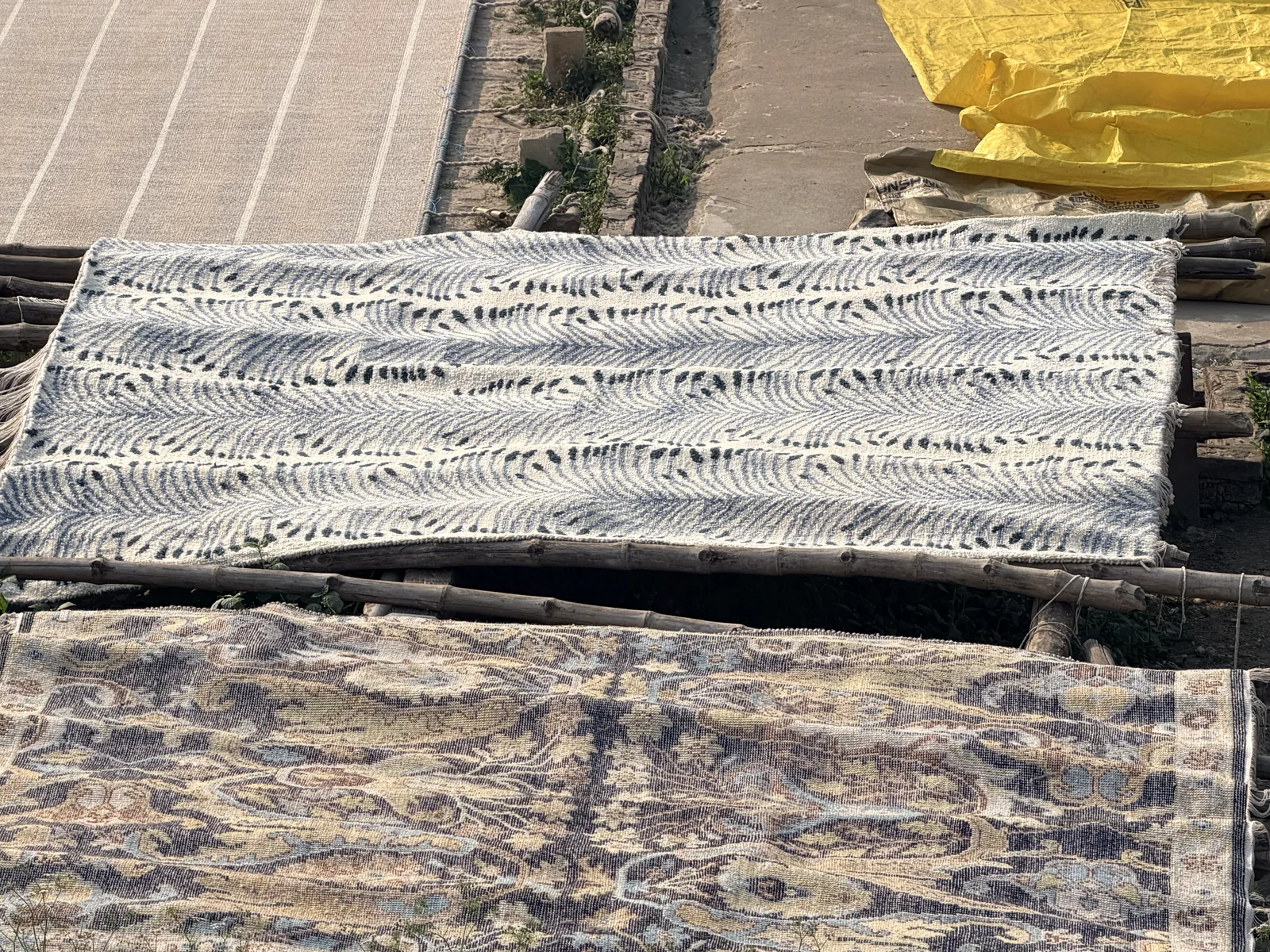 A rug drying after washing